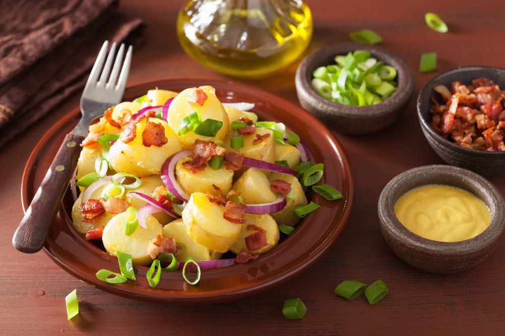 Potato salad with bacon and side of mustard