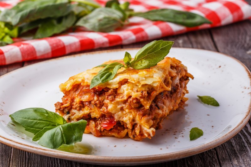 Homemade slice of Lasagna on a plate